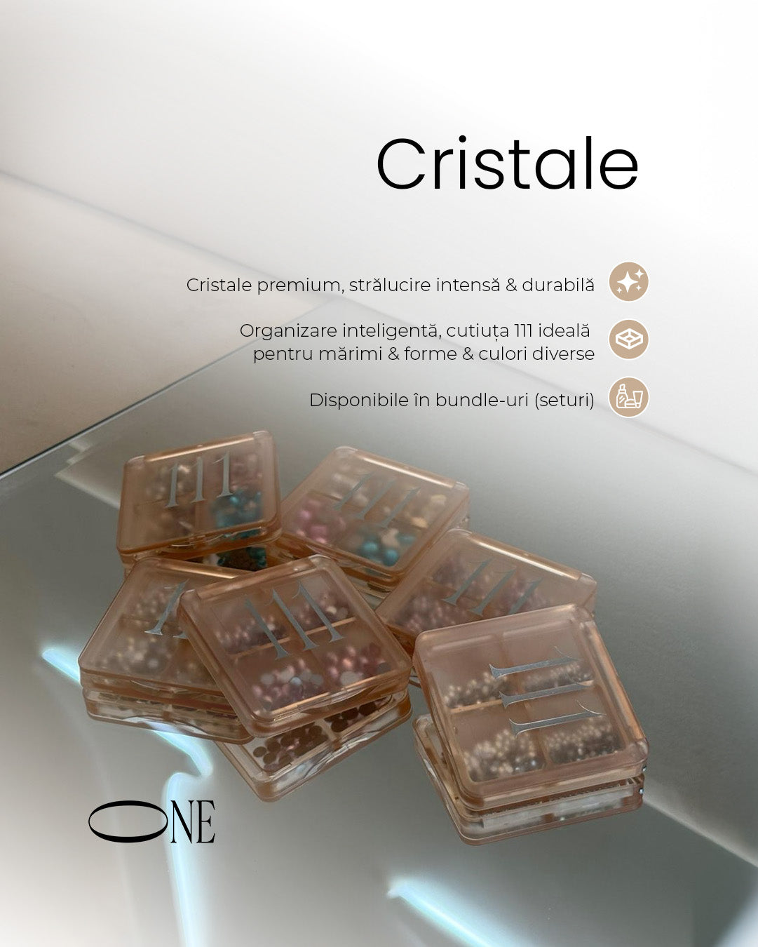 Stack of transparent containers with small items on a reflective surface, featuring the brand 'Cristale'.